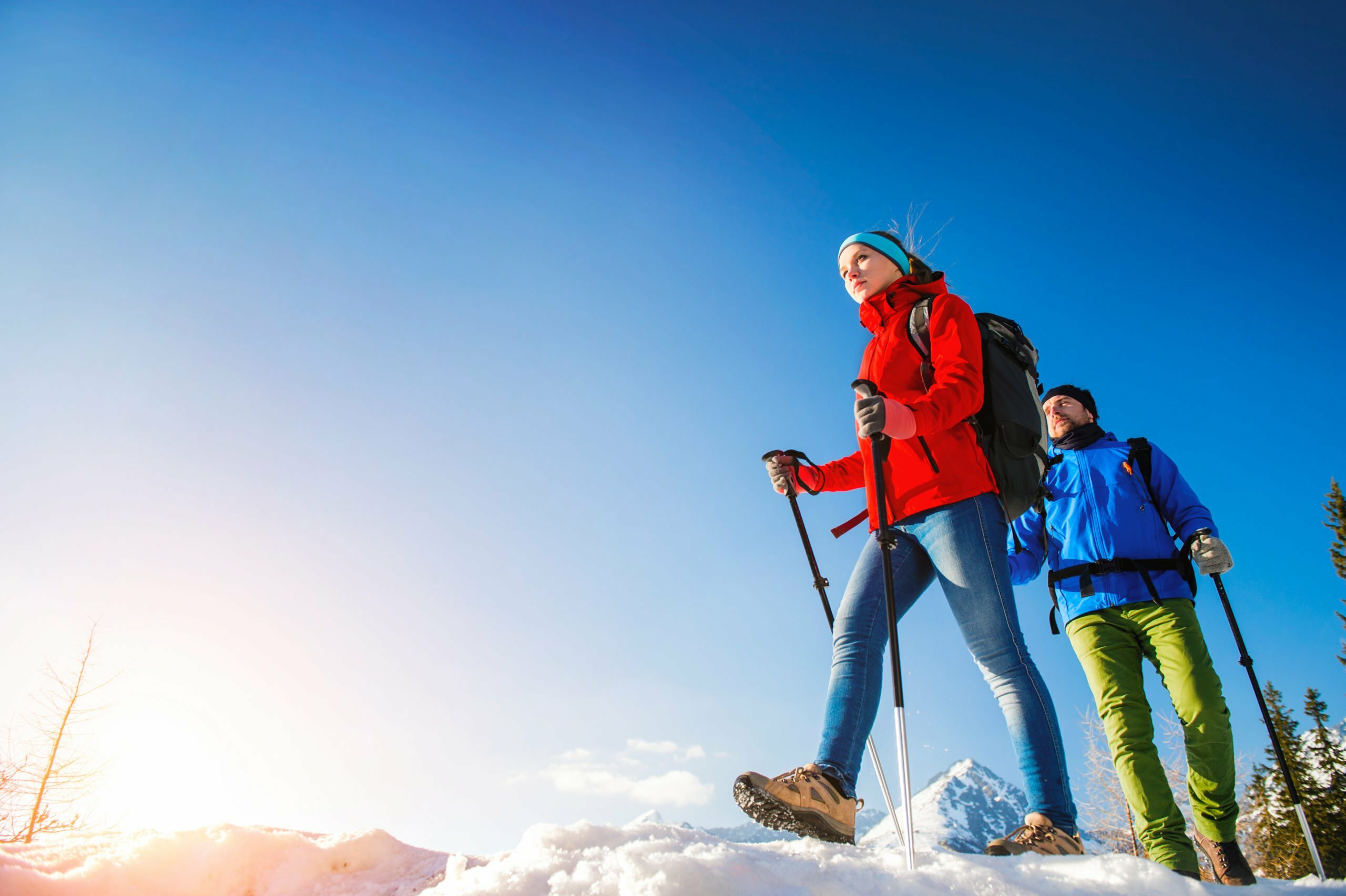 young couple hiking outside